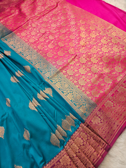 Banarasi Elegant Turquoise Blue Soft Katan Silk Saree with Magenta Contrast Border & Rich Zari Floral Weaving