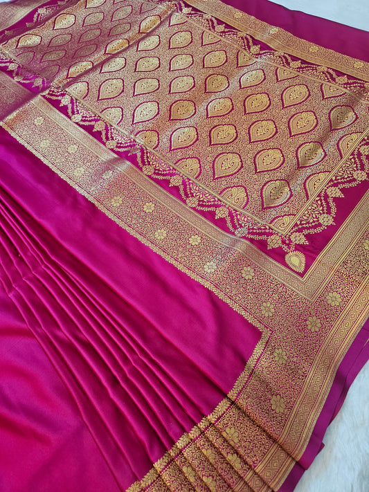 Banarasi Mashru Silk Saree in Rani Pink with Antique Gold Zari Paisley Pallu & Floral Border