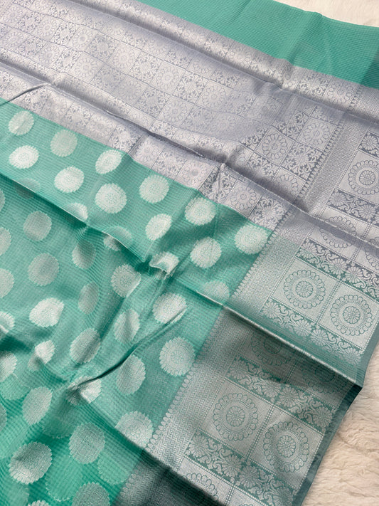 Banarasi Premium Cotton Kota Silk Saree in Sea Green with Silver Zari Buttas & Floral Designer Border