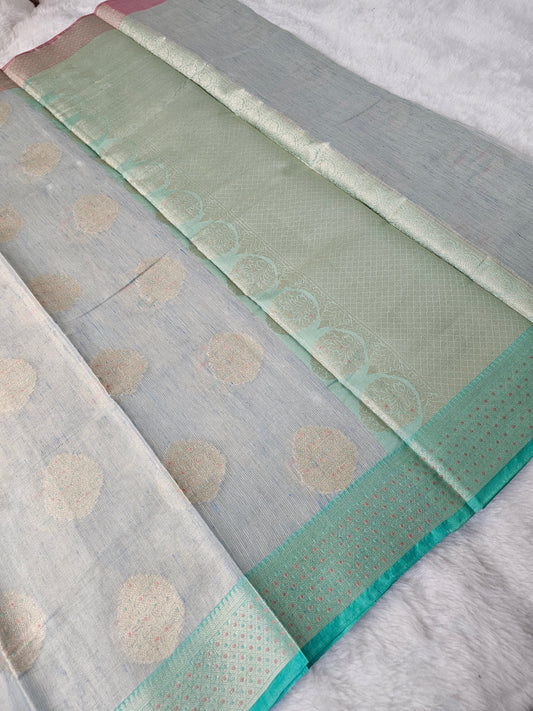 Banarasi Premium Ice Blue Tissue Silk Saree with Antique Gold Meena Buttas & Dual-Tone Banarasi Zari Border