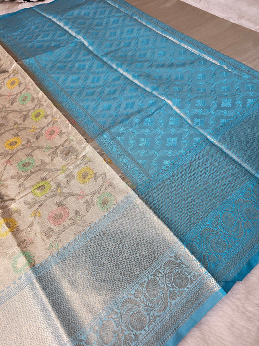 Banarasi Premium Aqua Blue Tissue Silk Saree with Multicolor Floral Weaving & Rich Jacquard Pallu