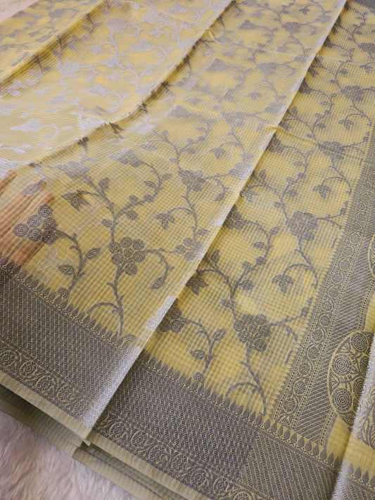 Banarasi Premium Kota Cotton Silk Saree with Pastel Yellow Body, Silver Floral Jaal Weaving & Designer Jacquard Pallu
