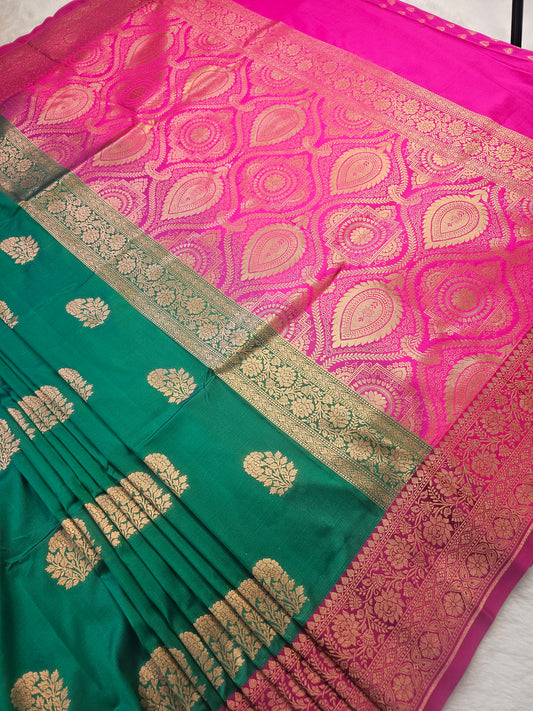 BanarasiPremium Soft Katan Silk Saree – Teal Green with Magenta Contrast Border & Rich Zari Weaving