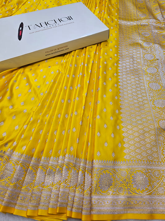 BanarasiPremium Yellow Tissue Silk Saree with Silver Zari Floral Banarasi Weaving & Rich Paisley Pallu