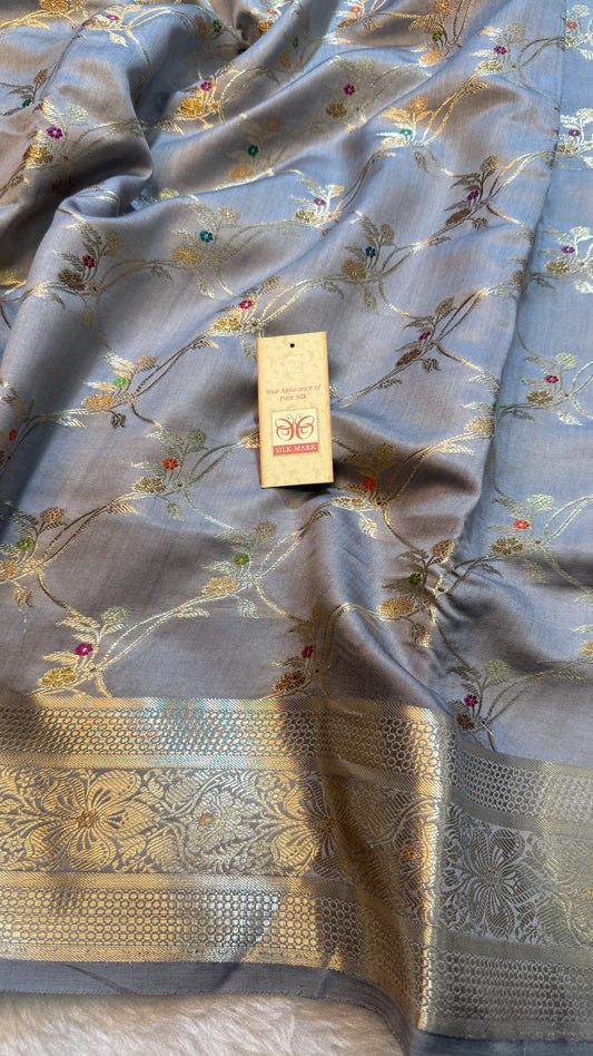 Banarasi Premium Pure Chiniya Silk Saree in Pearl Grey with Multicolor Meena Floral Weaving & Rich Silver Zari Pallu