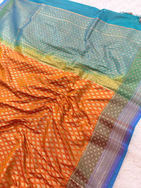 Banarasi Premium Soft Silk Saree in Orange Pink & Blue with Gold Zari Buttas and Contrast Green Border