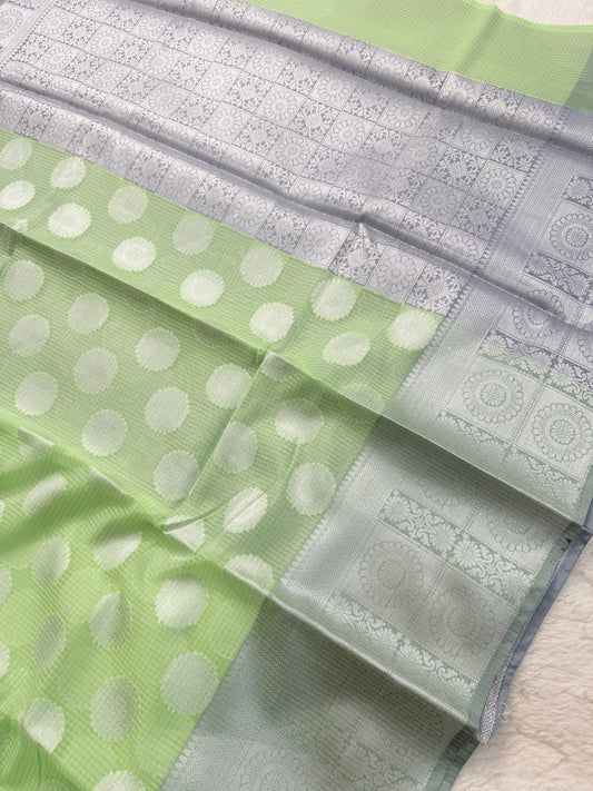 Banarasi Premium Cotton Kota Silk Saree in Pastel Green with Silver Zari Floral Border & Butta Motifs